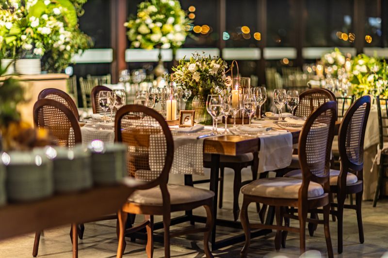 Tatte evening dining event with candles and guests