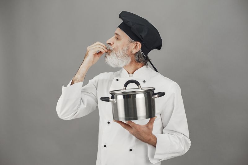 Tatte head chef in kitchen preparing dishes